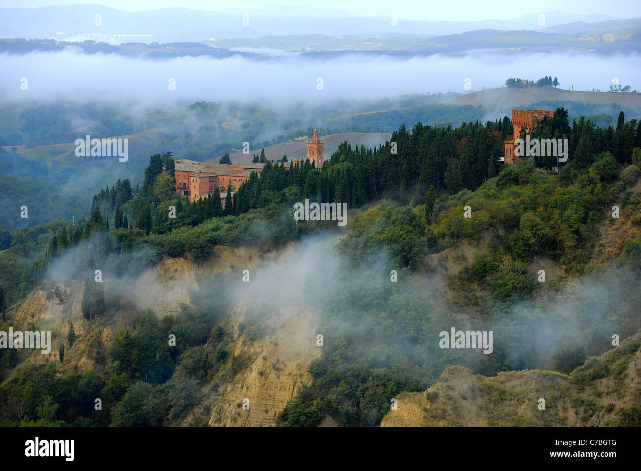 View of abbey Abbazia di Monte Oliveto Maggiore, Crete, Tuscany, Italy, Europe Stock Photo