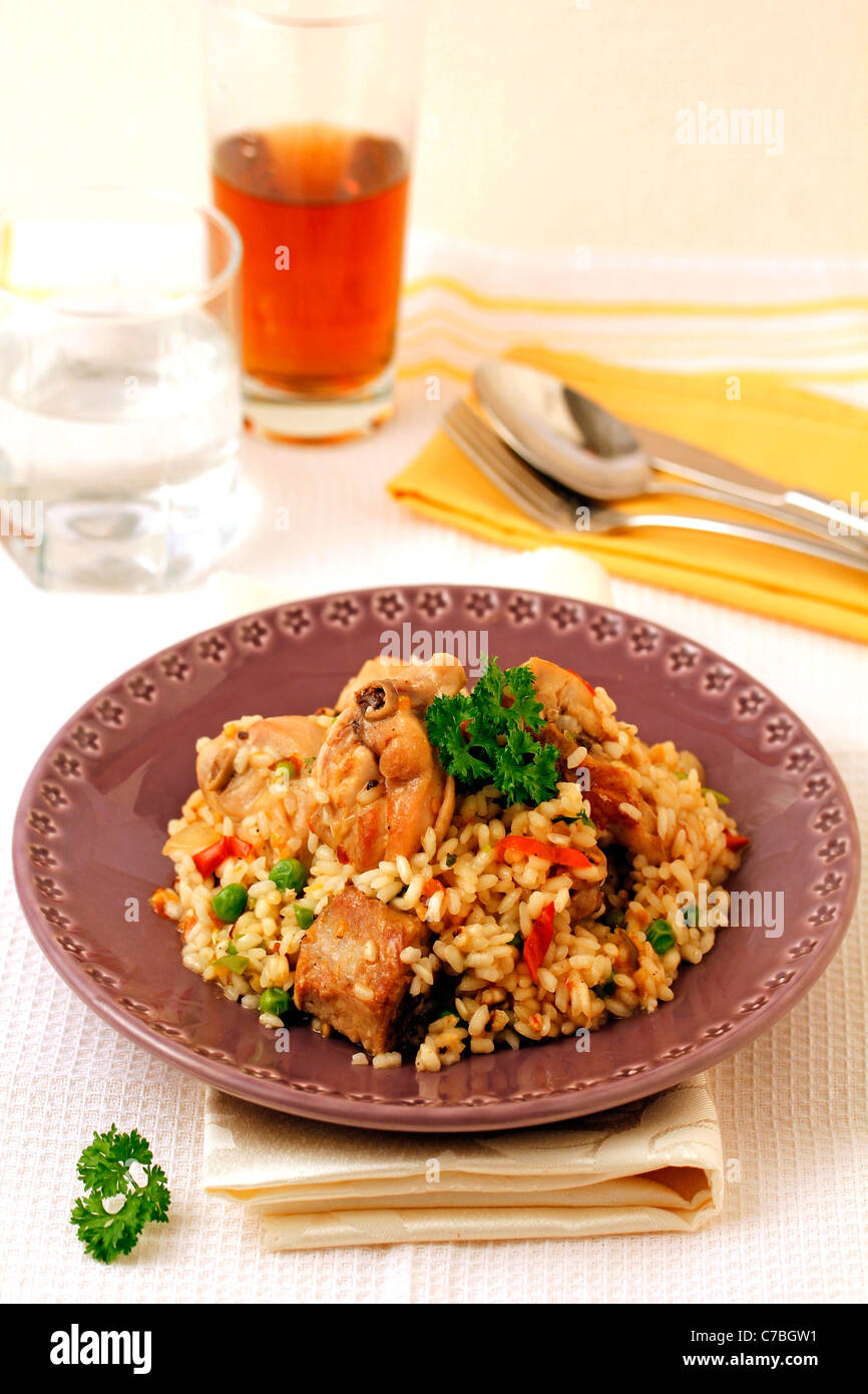 Rabbit with rice. Recipe available. Stock Photo
