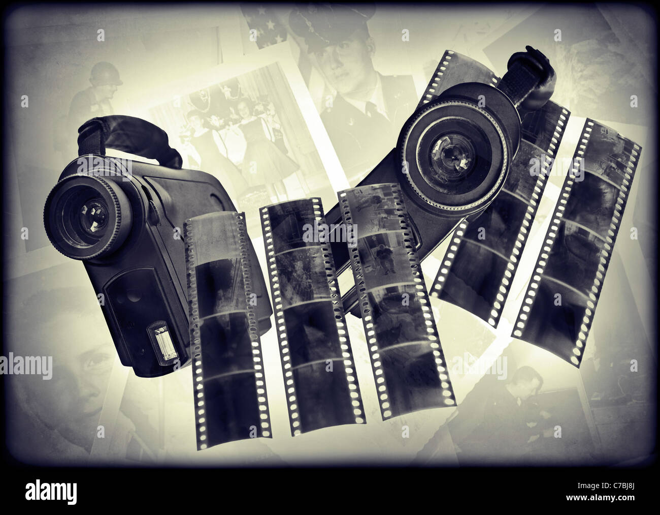 From film to digital concept. Two old digital cameras with negatives on a background of retro photos. Stock Photo