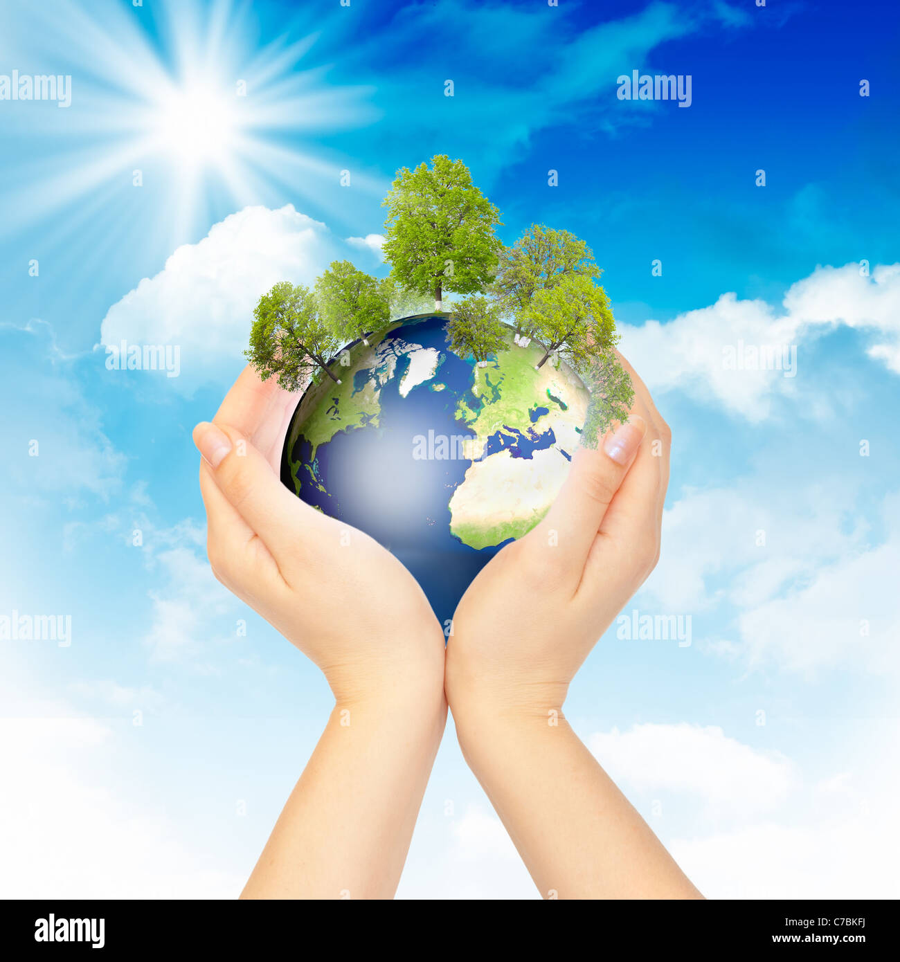 Hands and Earth. Concept Save green planet. Symbol of environmental protection. Stock Photo