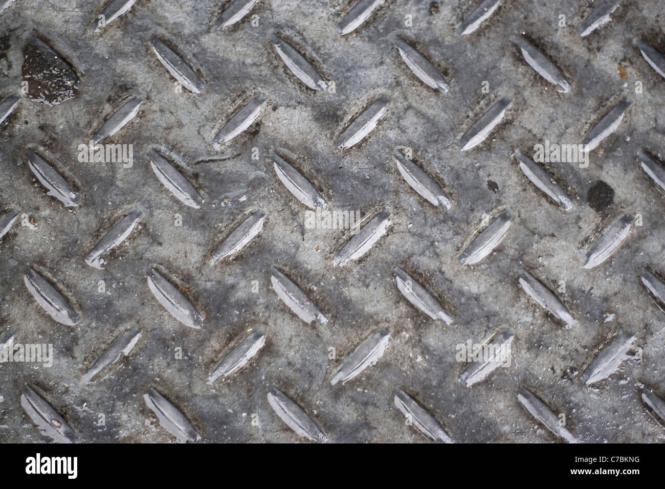 Closeup of real diamond plate material - this is a photo not an illustration. Stock Photo