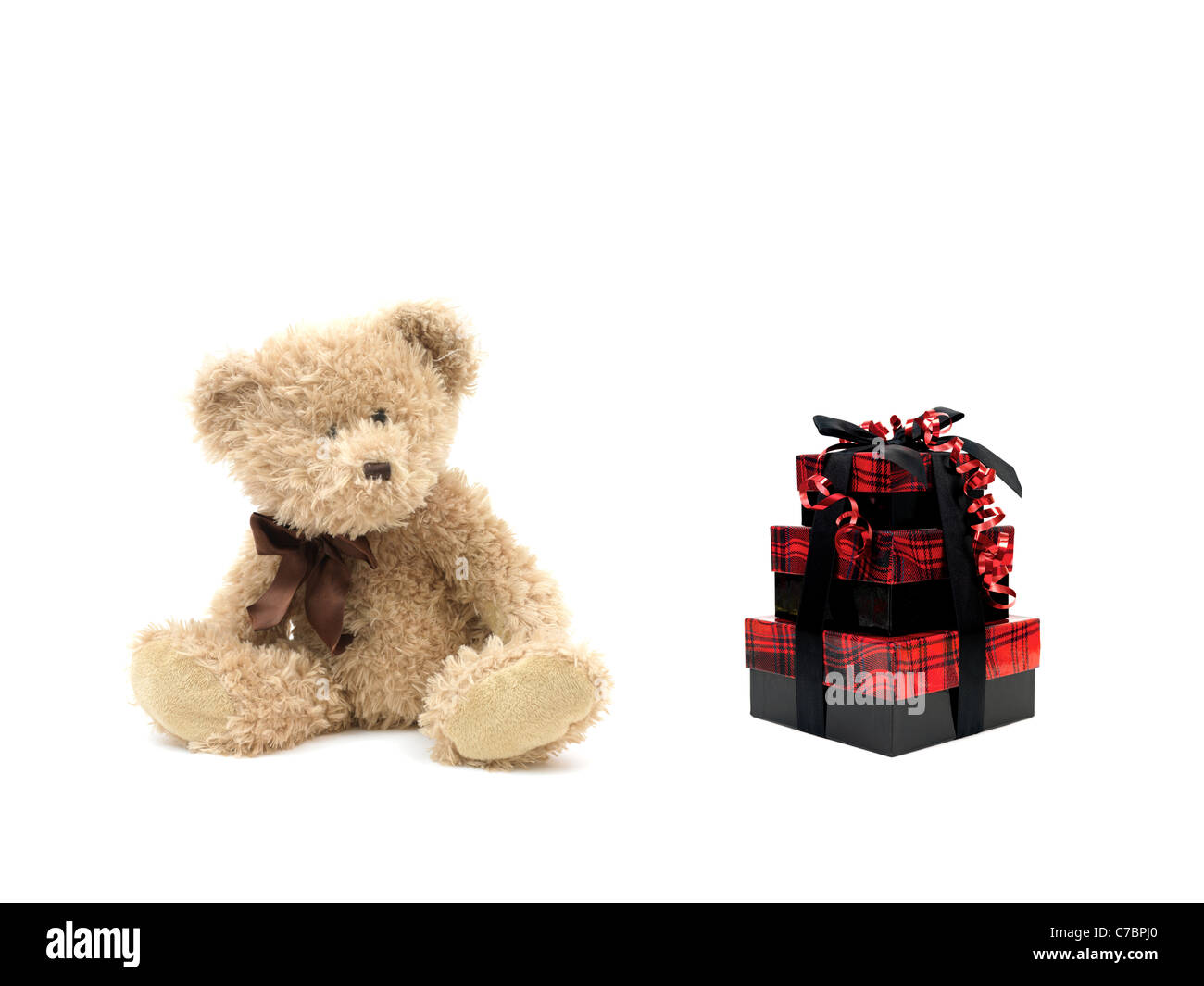 A teddy bear isolated against a white background Stock Photo - Alamy
