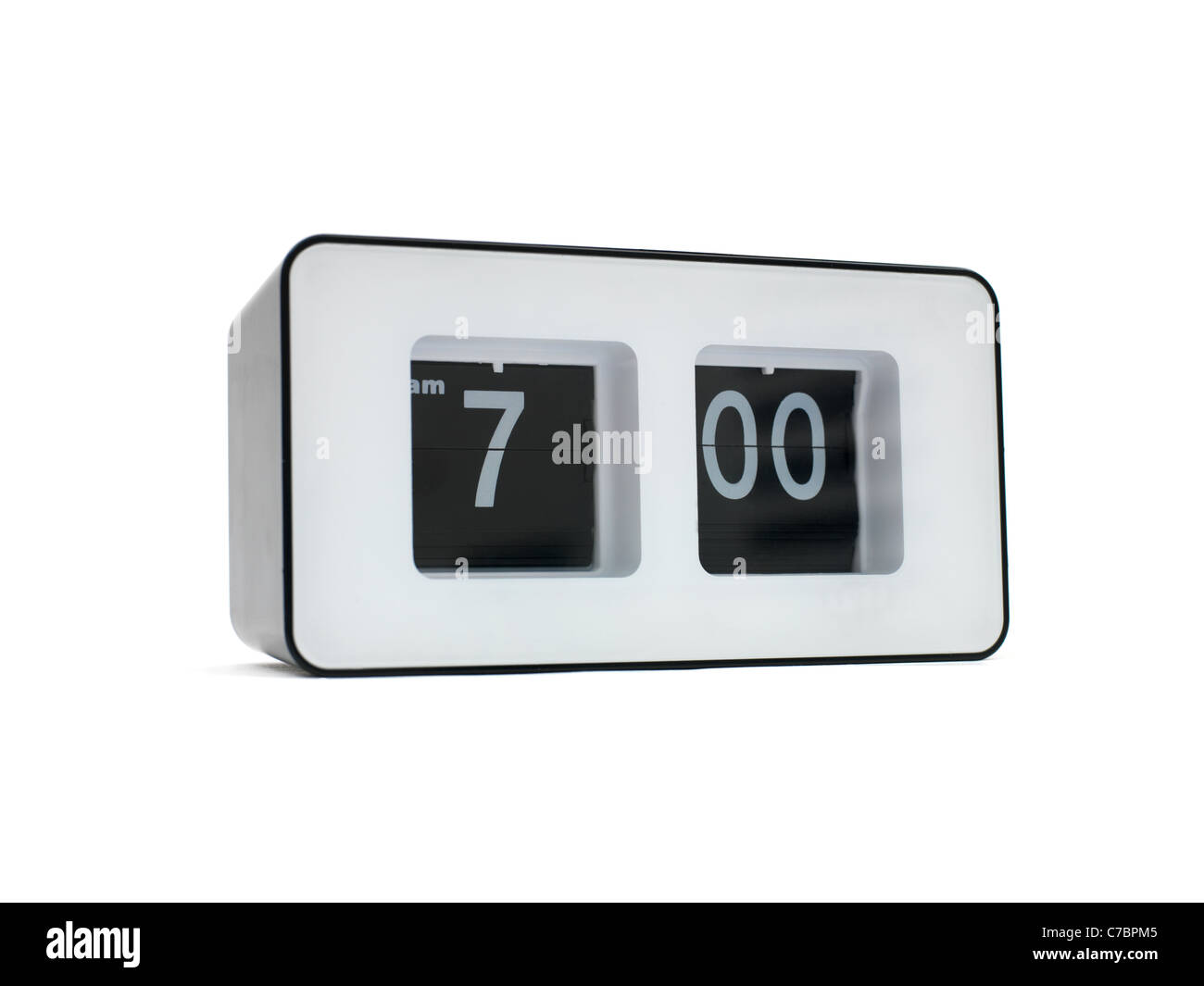 A flip clock isolated against a red background Stock Photo - Alamy