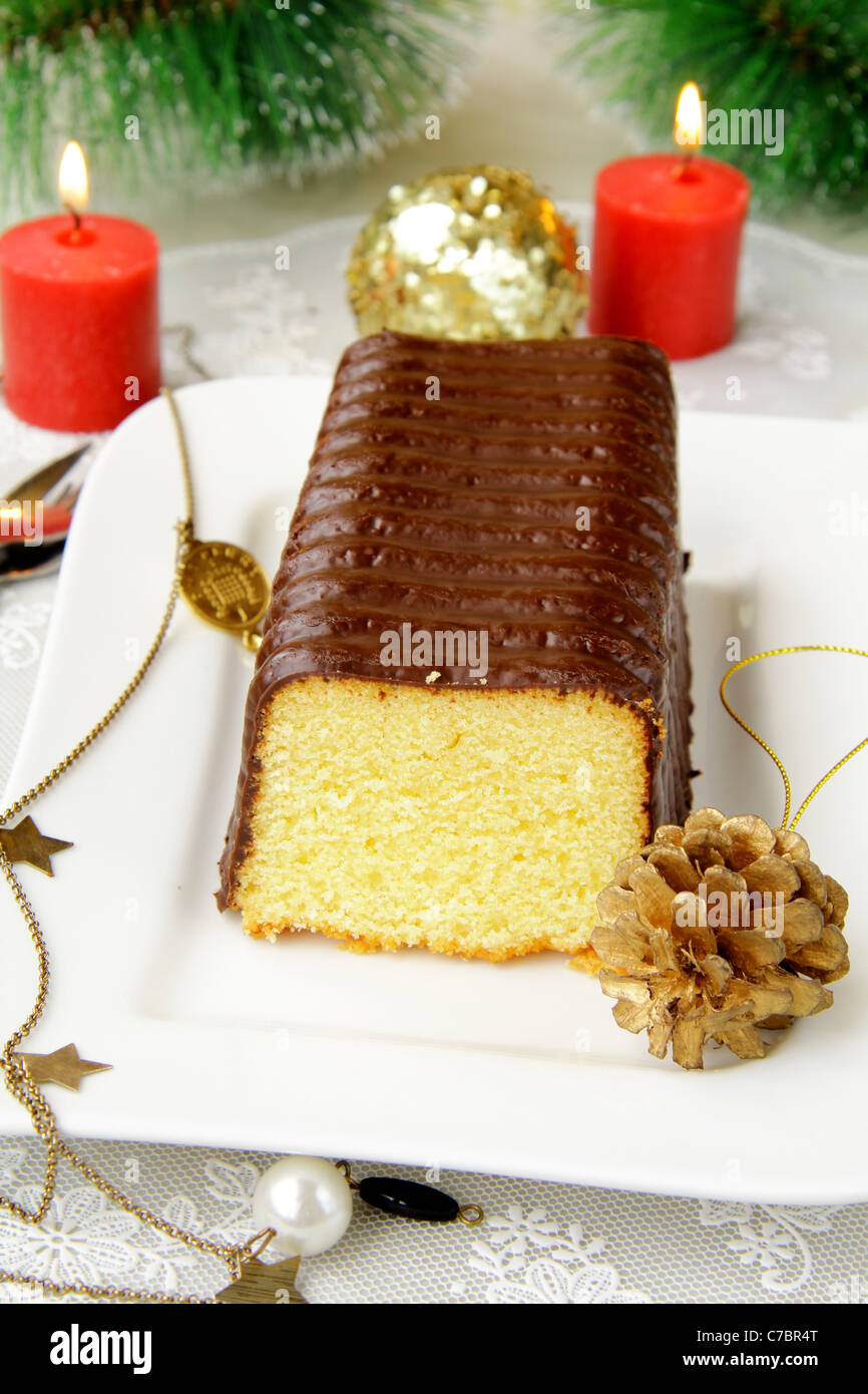 cake with chocolate icing, the Christmas table setting Stock Photo
