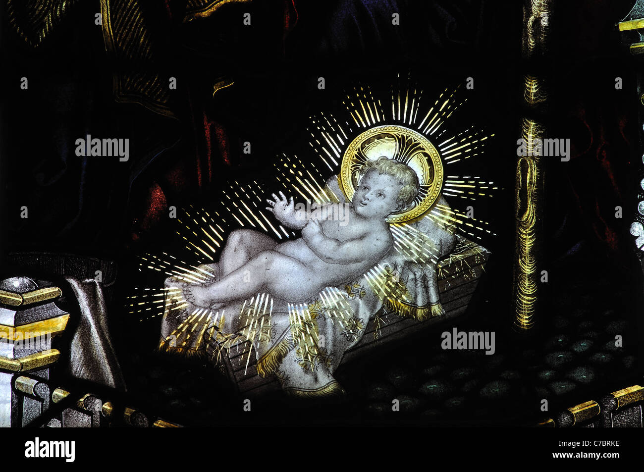Infant Jesus detail of nativity stained glass, All Saints Church, Gilmorton, Leicestershire, England, UK Stock Photo