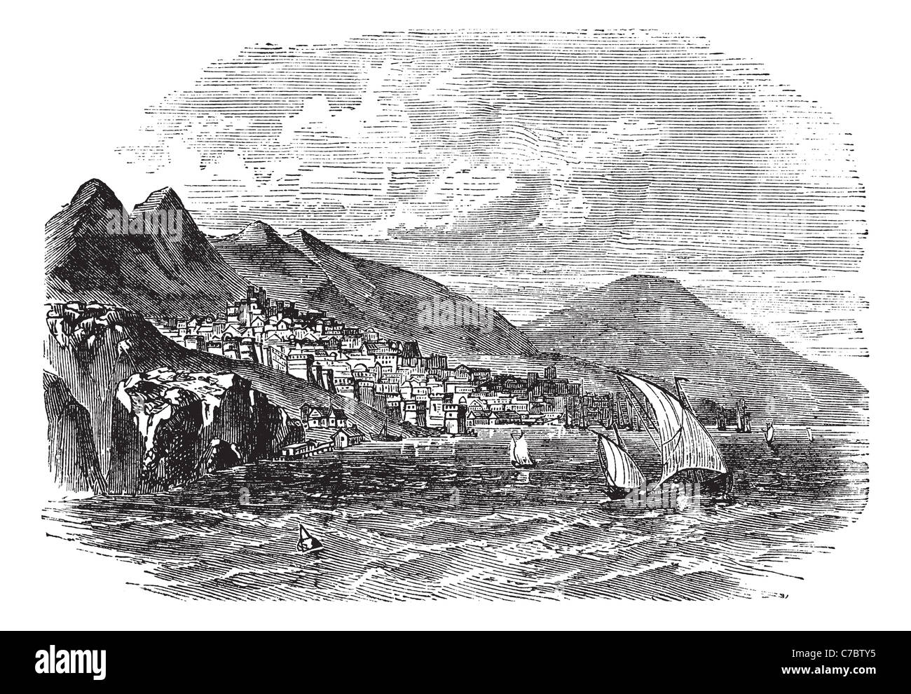 Feodosiya in Crimea, Ukraine, during the 1890s, vintage engraving. Old engraved illustration of Feodosiya with lake in front. Stock Photo