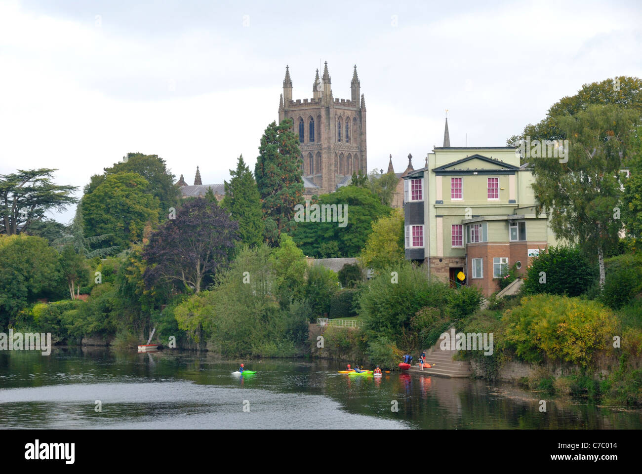 Hereford Cathedral and canoeists on the river Wye, Hereford, England Stock Photo