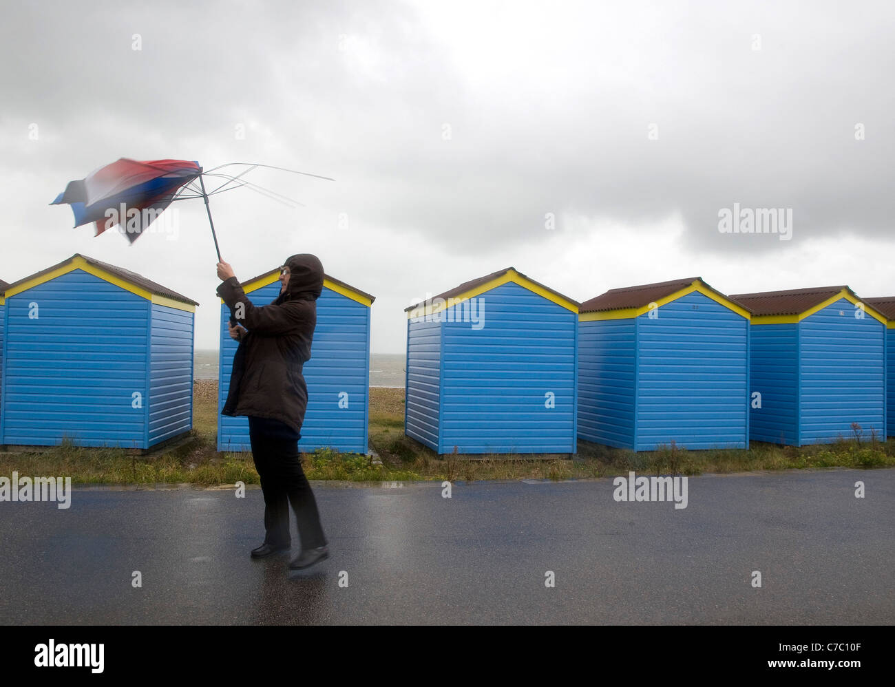 Struggling with wind hi-res stock photography and images - Alamy