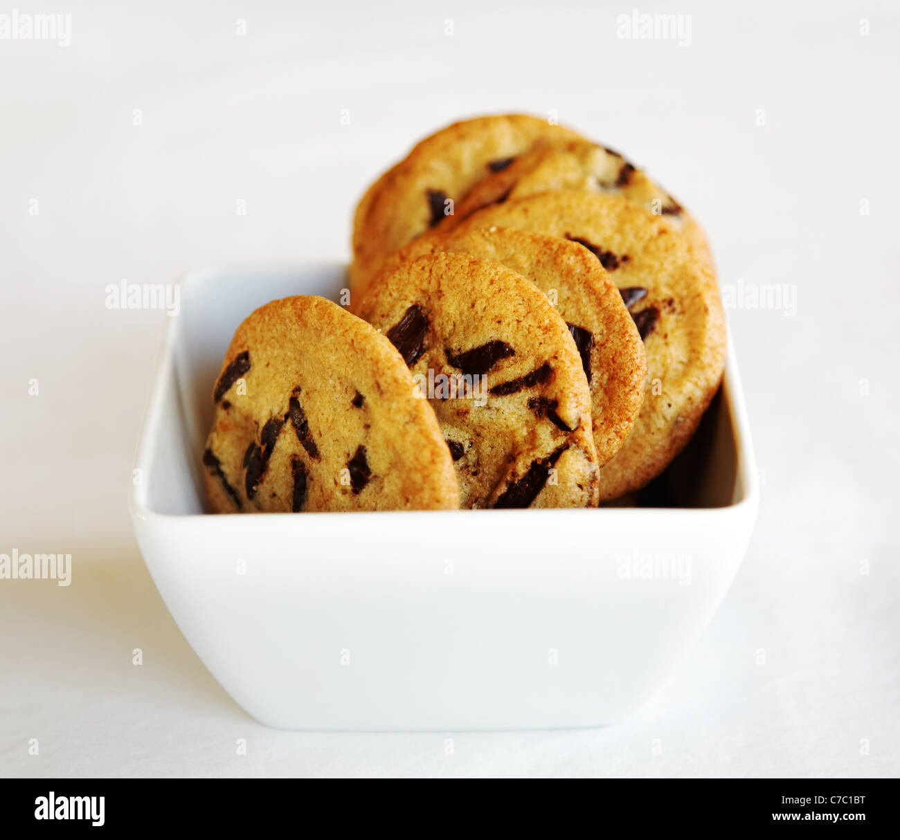 Chocolate chip cookies in white bowl, by pastry chef Laurie Pfalzer, Pastry Craft Stock Photo