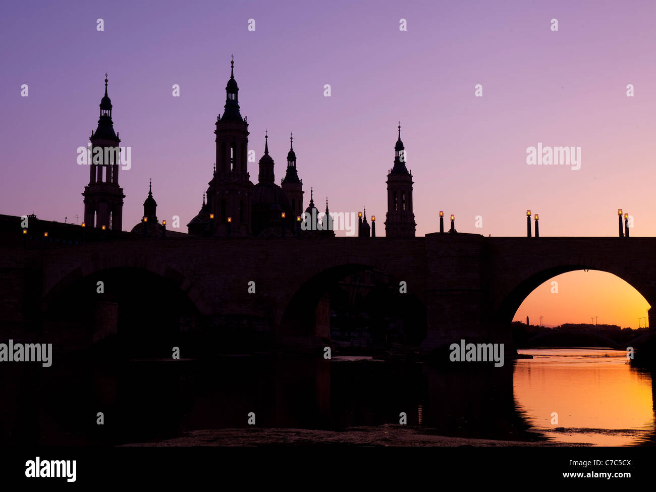 Roman bridge and basilica of "El PIlar" in Zaragoza (Spain Stock Photo