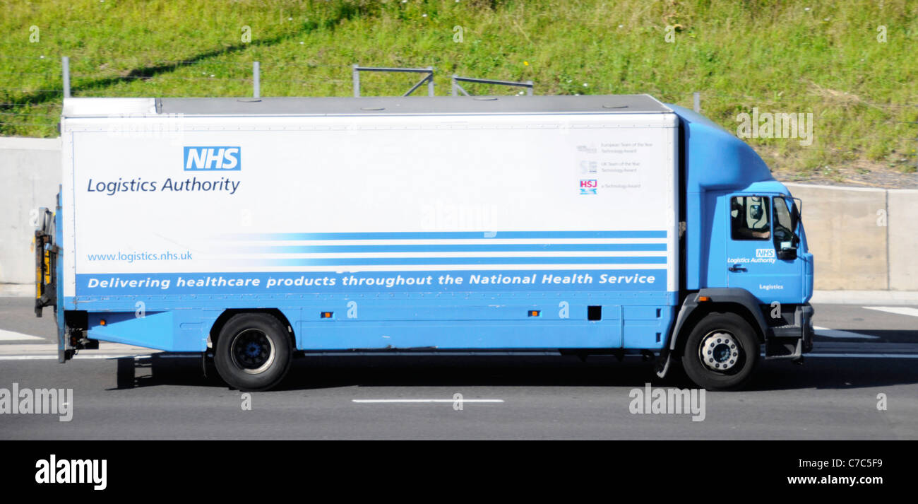 National Health Service Logistics Authority lorry part of supply chain keeps NHS healthcare services working driving along English UK motorway Stock Photo