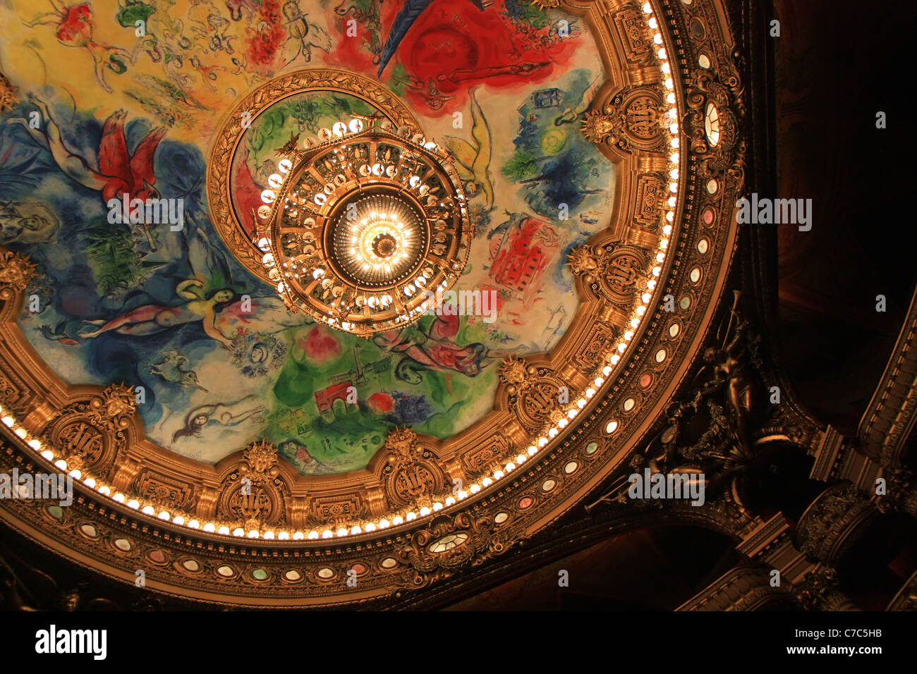 Magnificent chandelier and painted ceiling of the auditorium of opera Garnier, Paris, France Stock Photo
