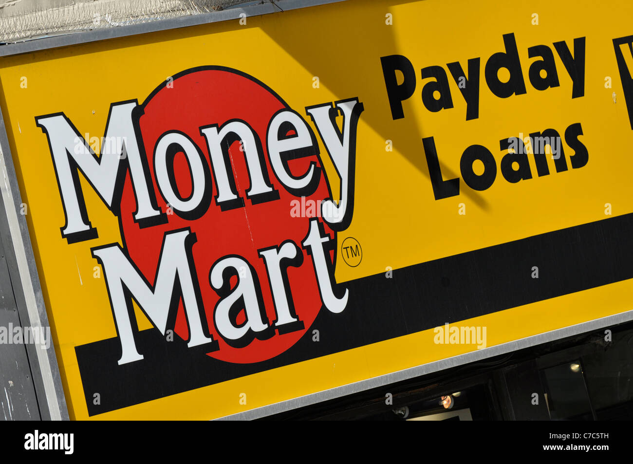 Payday Loans Sign on store front, Money Mart. Stock Photo