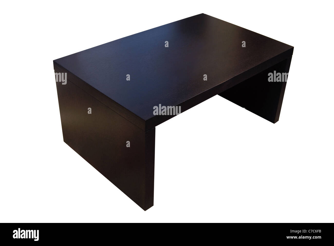 Contemporary brown wooden coffee table isolated over white background with clipping path. Stock Photo