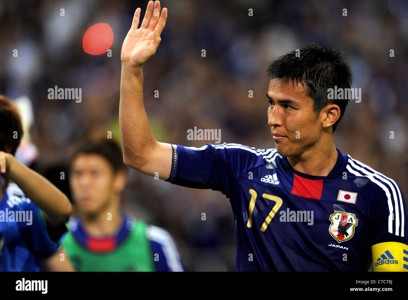 Makoto Hasebe (JPN) waves to Japan's fans after the 2014 FIFA World Cup Asian Qualifiers Japan 1-0 North Korea. Stock Photo
