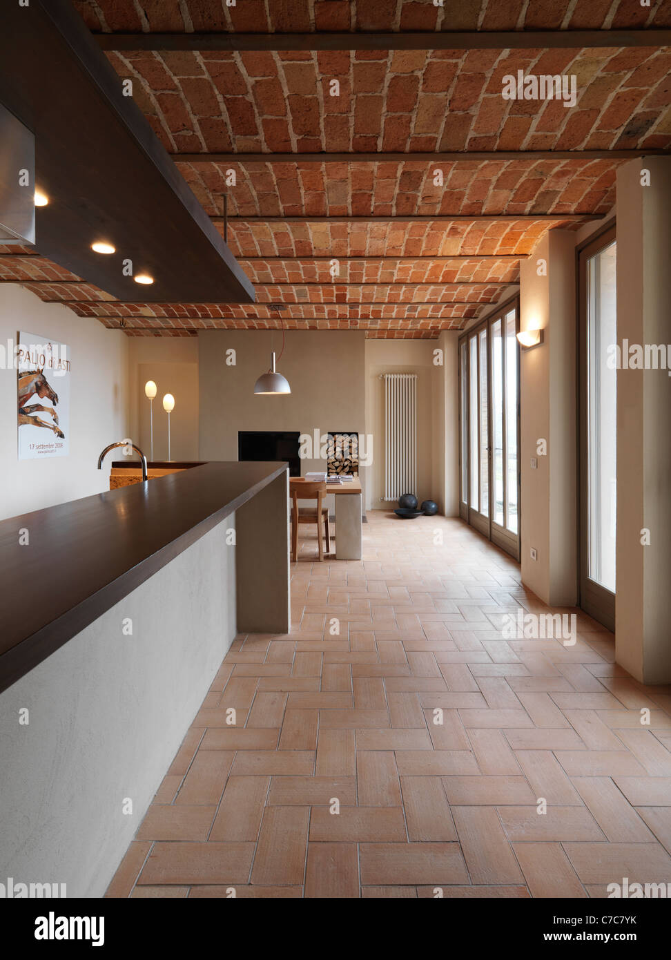 Dining Room In The Rustic House With Terracotta Floor And Brick