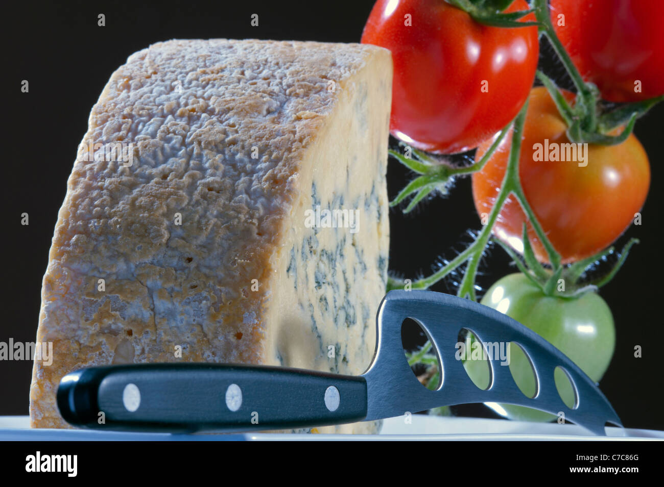 Cut of full fat soft blue cheese Stock Photo Alamy