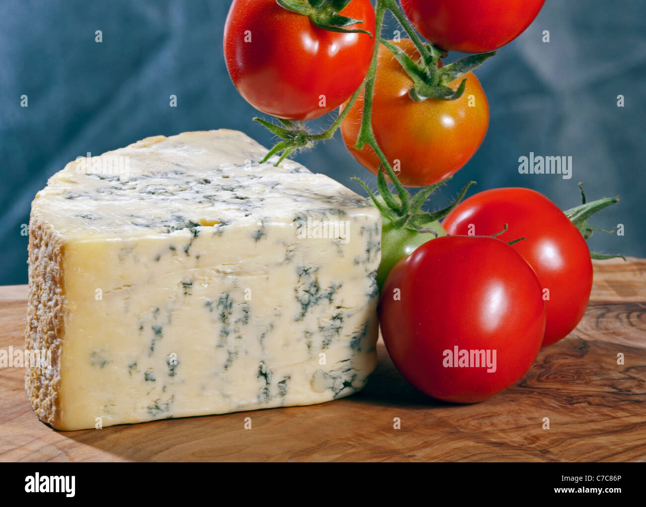 Slice of full fat soft blue cheese Stock Photo