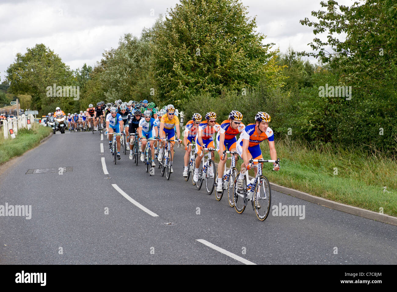 Tour of Britain 2011 road cyclists race down Bury St Edmunds to Sandringham Norfolk Stock Photo