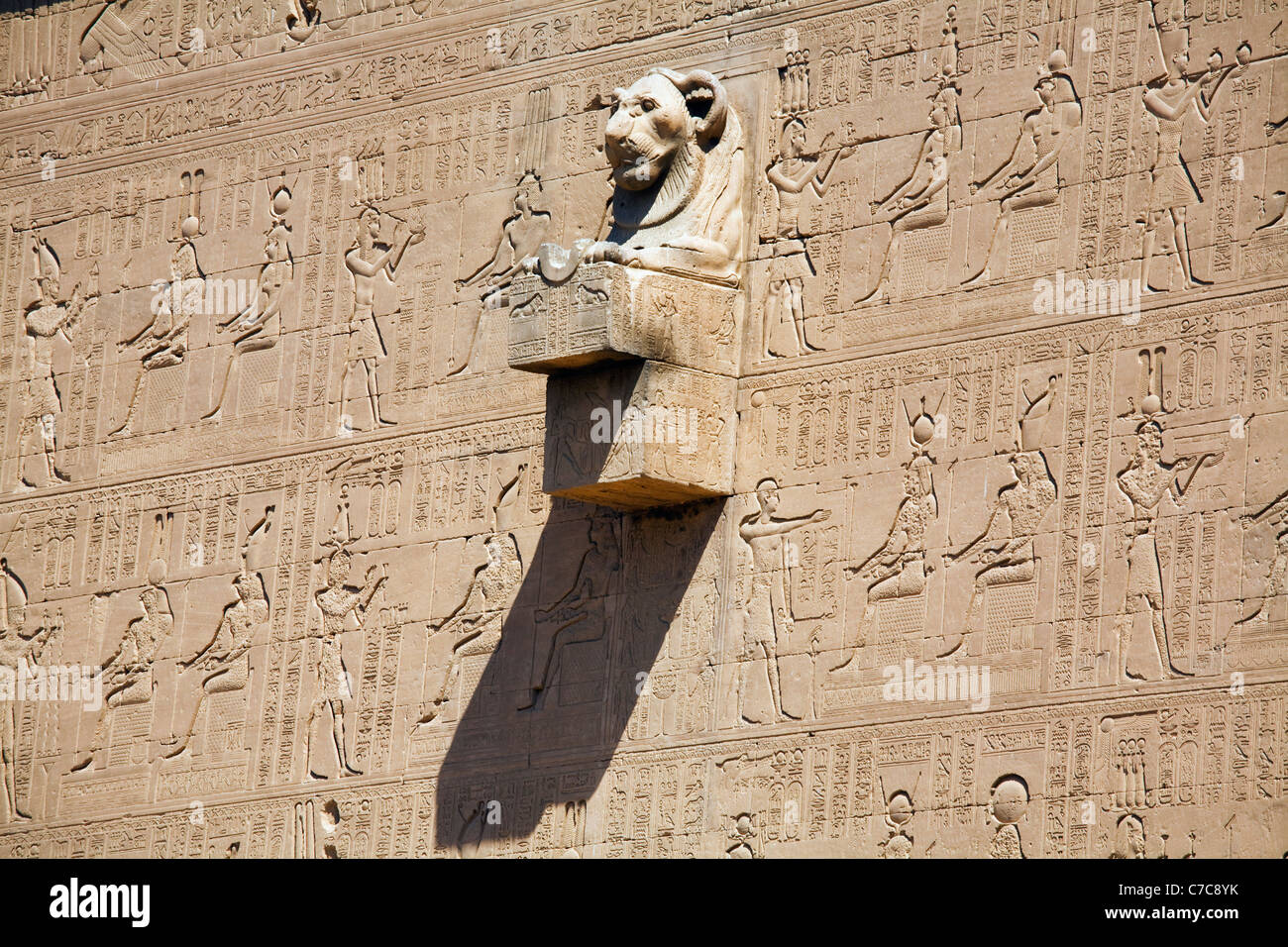 Lion-headed water spout on the relief covered wall of the Temple of ...