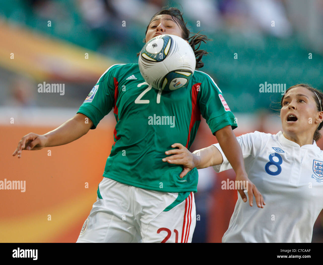 Stephany Mayor of Mexico (21) brings the ball down against Fara Williams of England (8) during a 2011 Women's World Cup match. Stock Photo