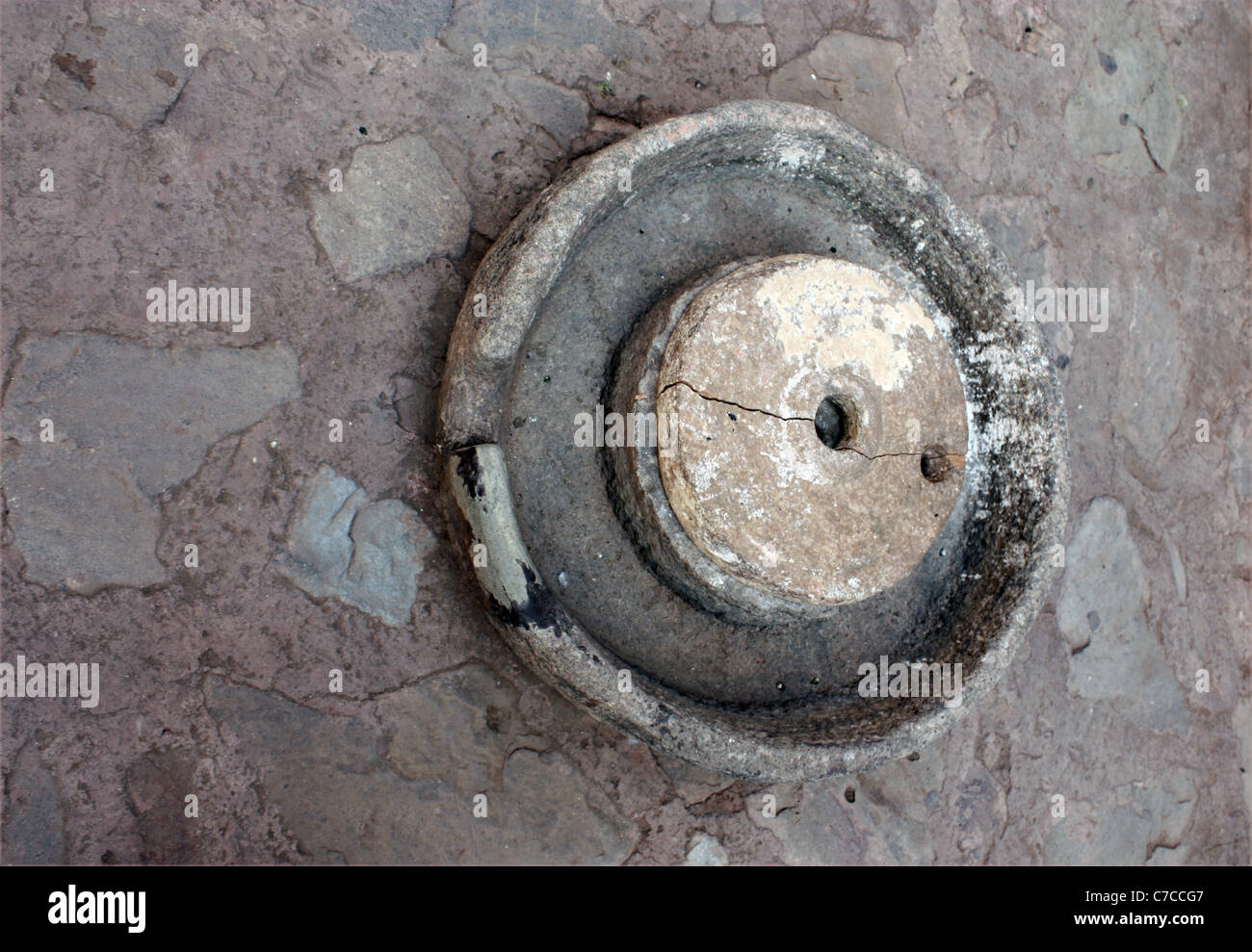 A rock hollow rotor for holding the hinge and rotating to grid flour Stock Photo