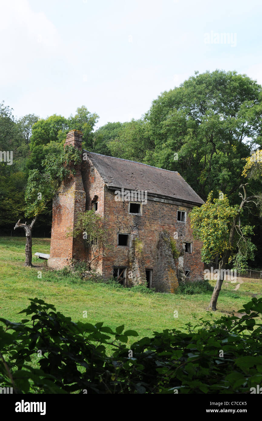 Derelict cottage in a Shropshire field England Uk Stock Photo