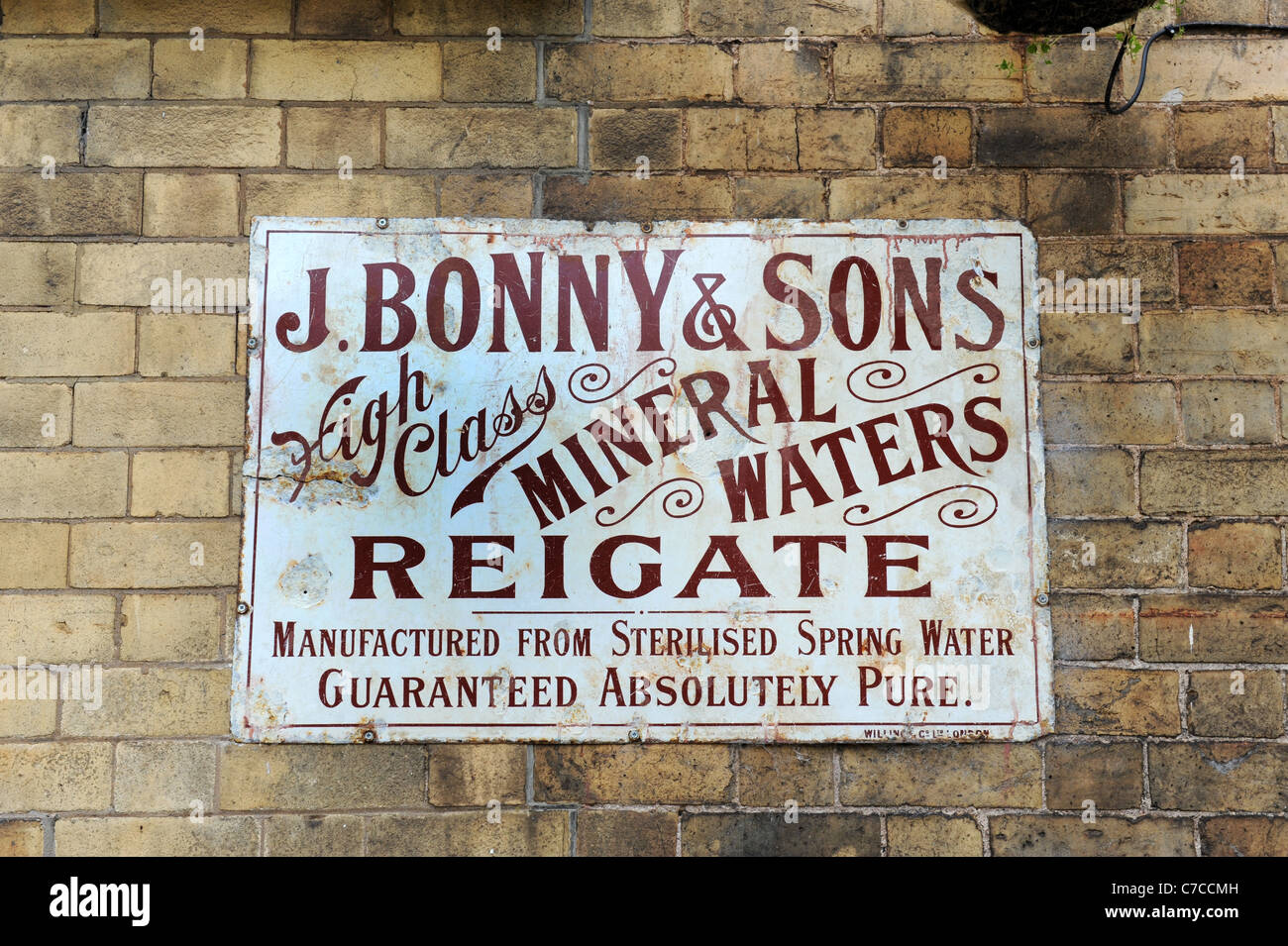 Old victorian enamel advert for J Bonny and sons mineral water Uk Stock Photo