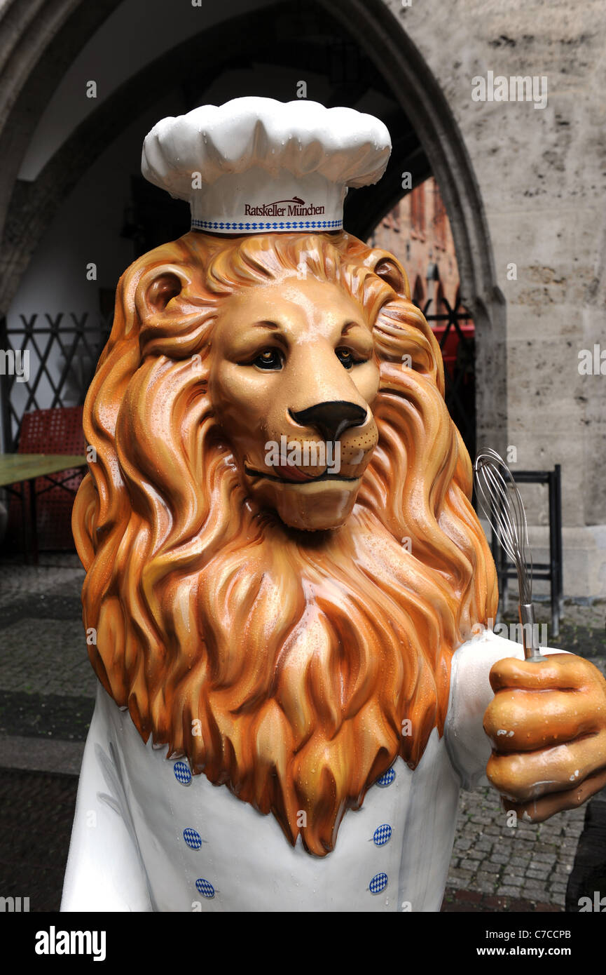 Bavarian Lion figure promoting Marienplatz restaurant in front of Ratskeller Munich Bavaria Germany Munchen Deutschland Stock Photo