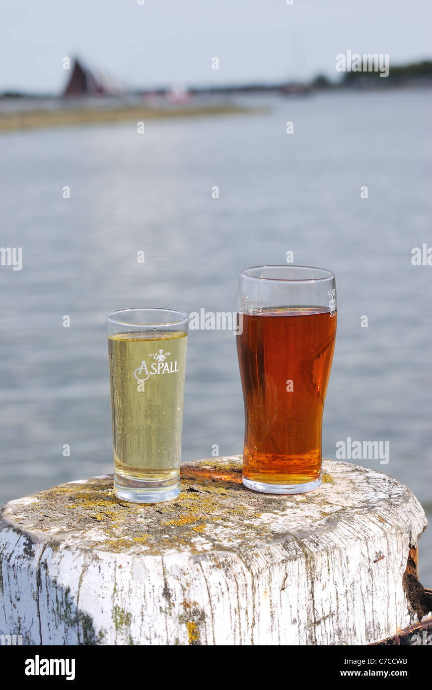 Glass of cider and Beer over river Stock Photo Alamy