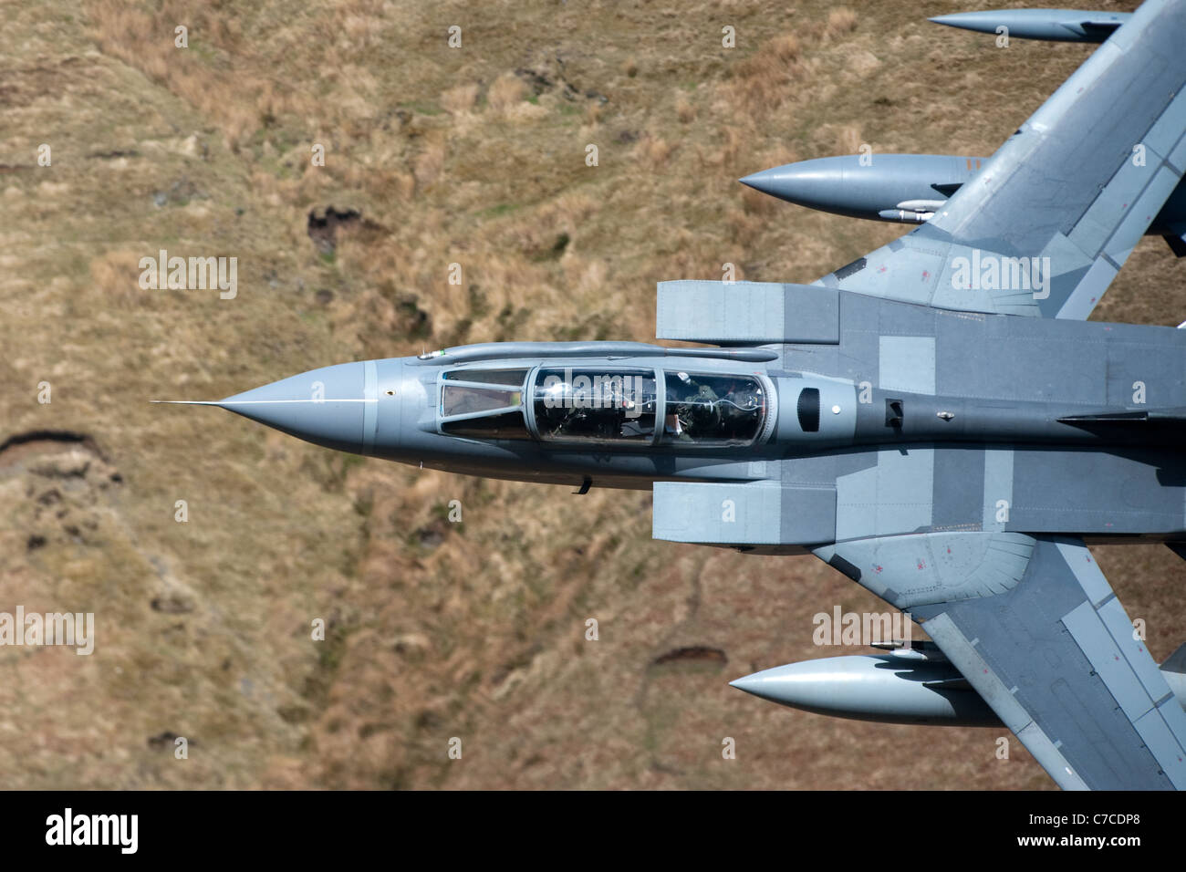 Panavia Tornado GR. 4 flying at low level in mid Wales shot from the hill side Stock Photo