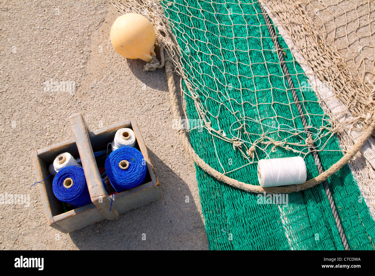fishing net repair kit with sewing thread spool box Stock Photo Alamy