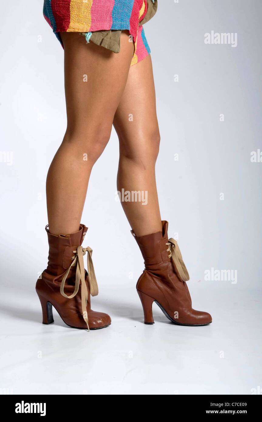 Vivienne Westwood shorts and boots. Stock Photo