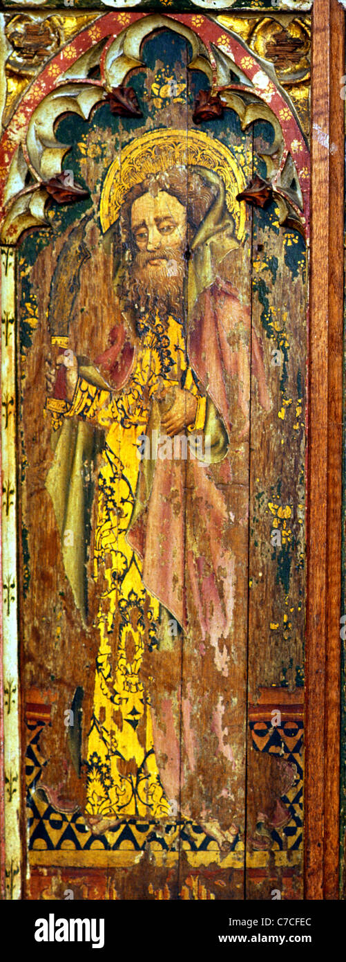 Old Hunstanton, Norfolk. Rood screen apostle St. Batholomew holding Flaying Knife apostles English medieval screens painting Stock Photo