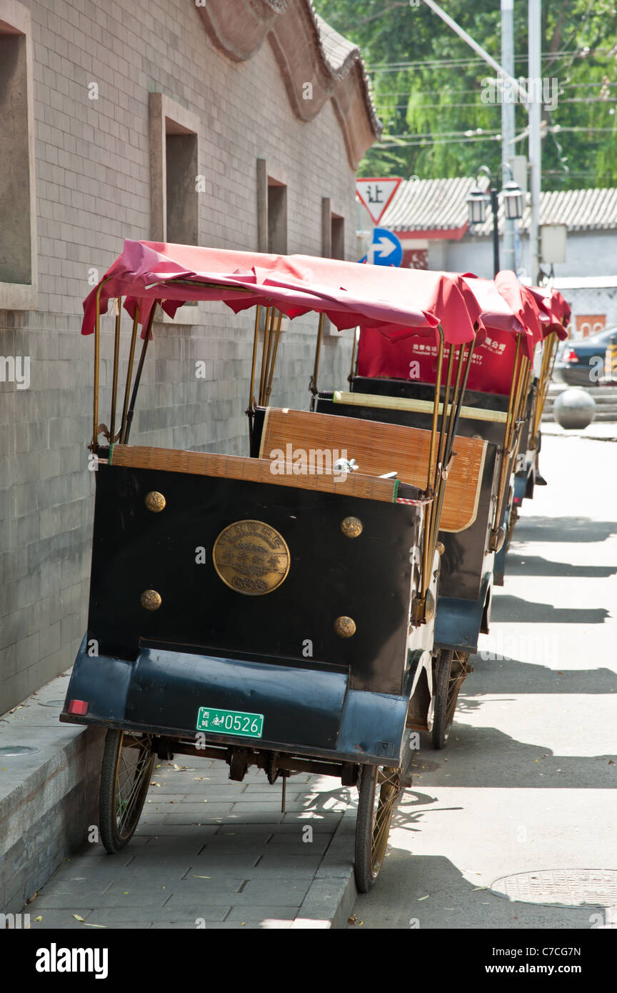 Decorated tricycles in a beijing hutong hires stock photography and