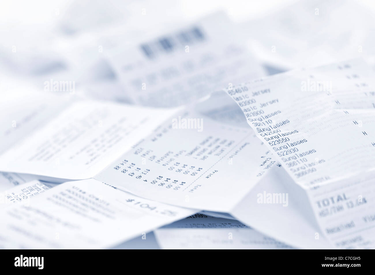 Paper cash register receipts in a lose pile close up Stock Photo