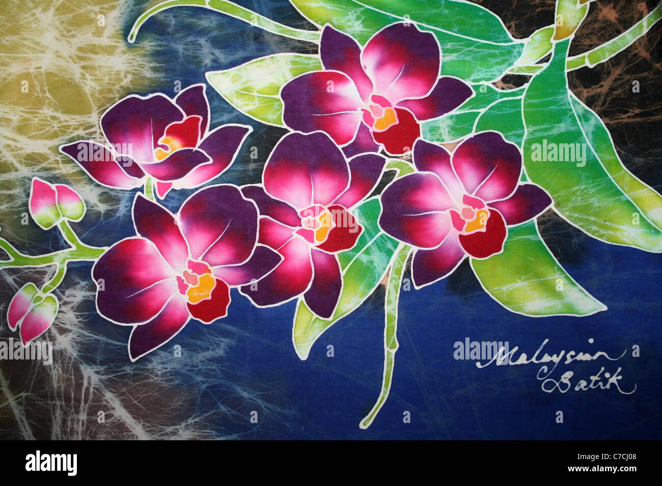 Purple Pink Orchids On A Malaysian Batik Stock Photo