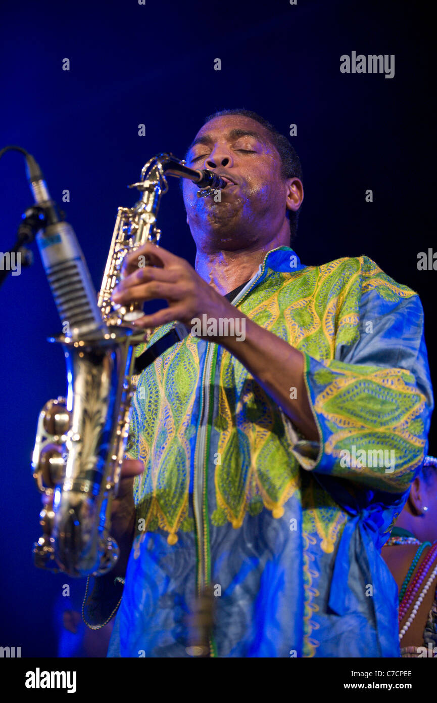 African Nigerian musician FEMI KUTI playing saxophone with his band at