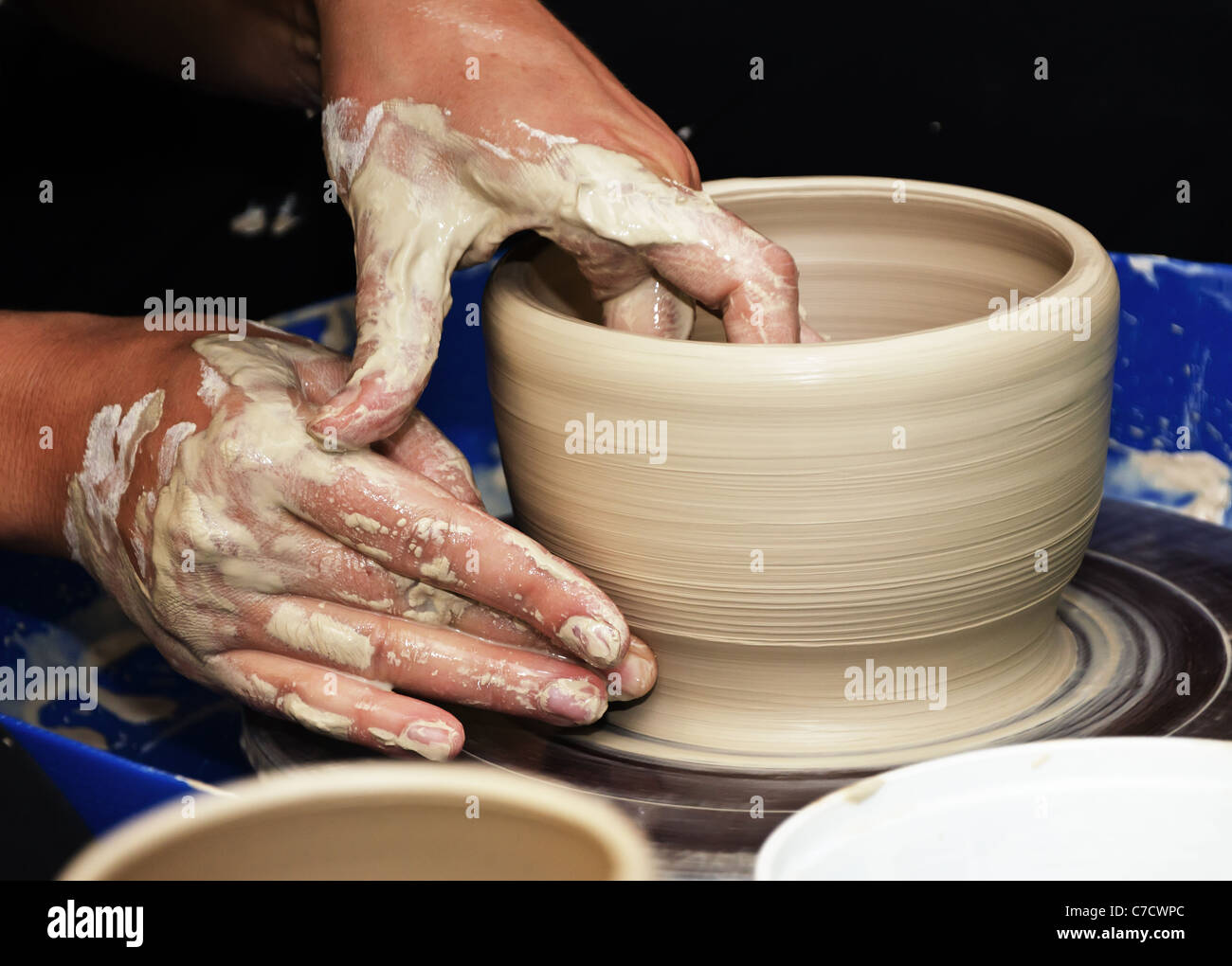 The process of creating pottery by hand Stock Photo Alamy