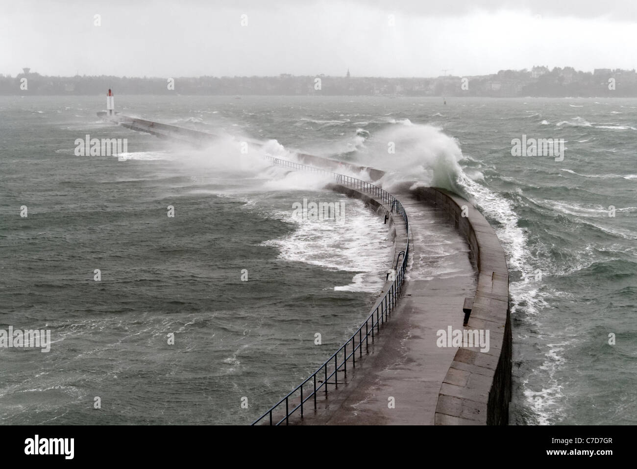 Storm in St Malo, powerful waves against pier (Môle des Noires