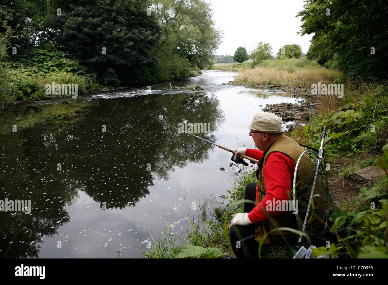 Fisherman on the River Wear, Northumberland, UK. Stock Photo