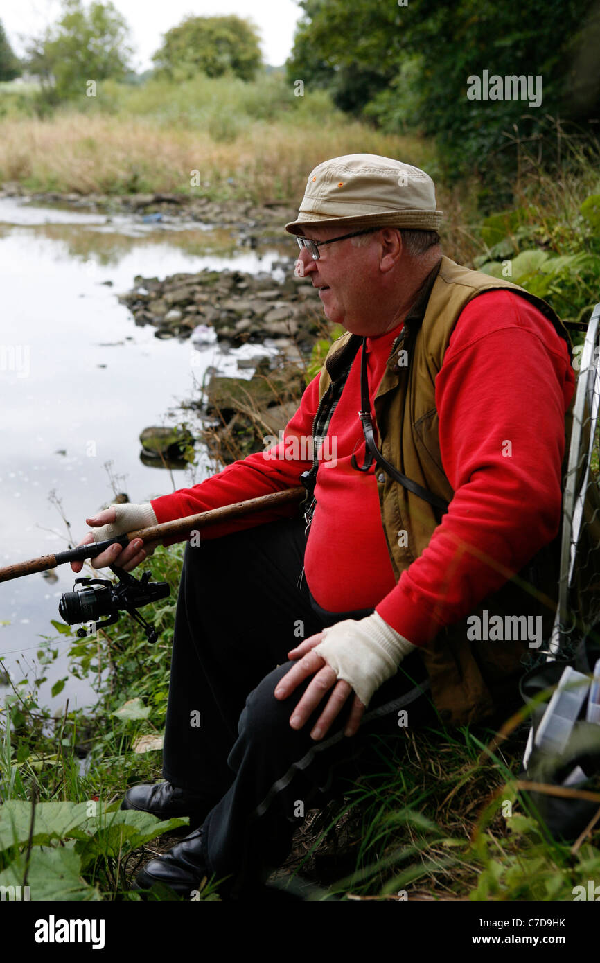 Fisherman on the River Wear, Northumberland, UK. Stock Photo