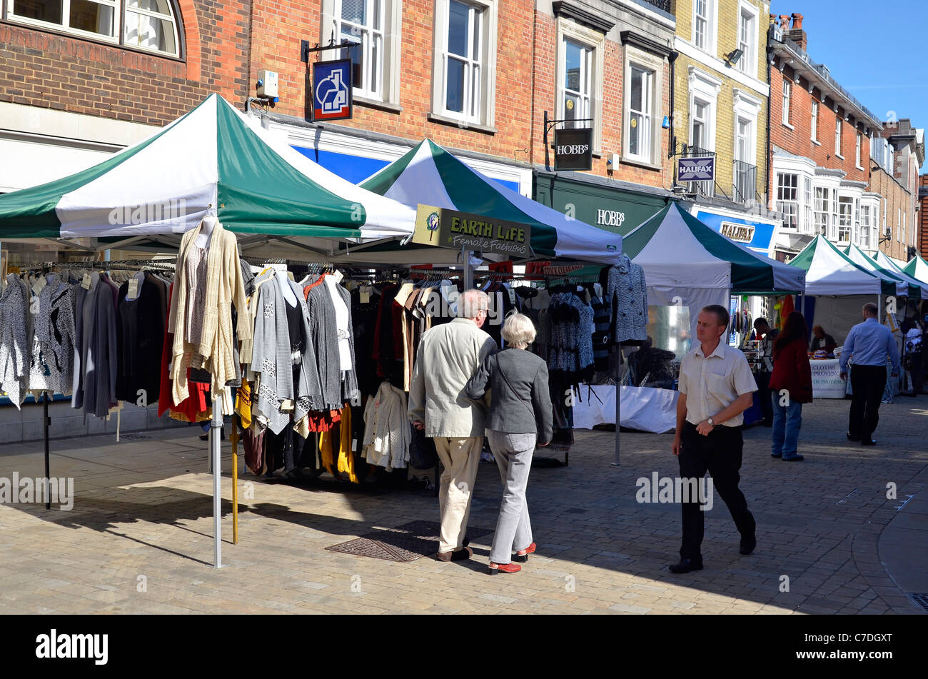 Shops and market stalls in Winchester High Street, Winchester