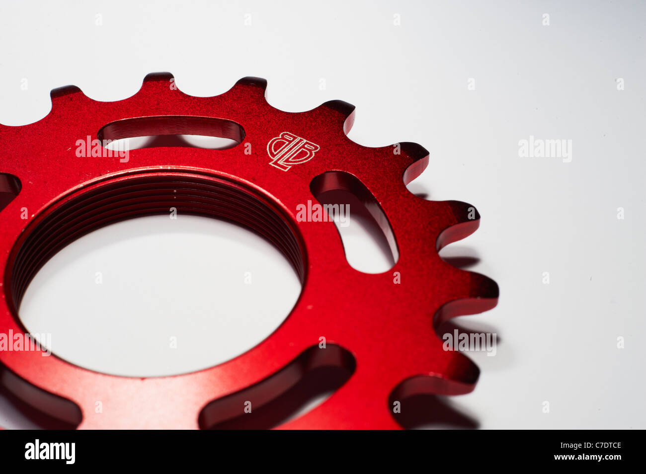 red anodised fixed gear sprocket Stock Photo