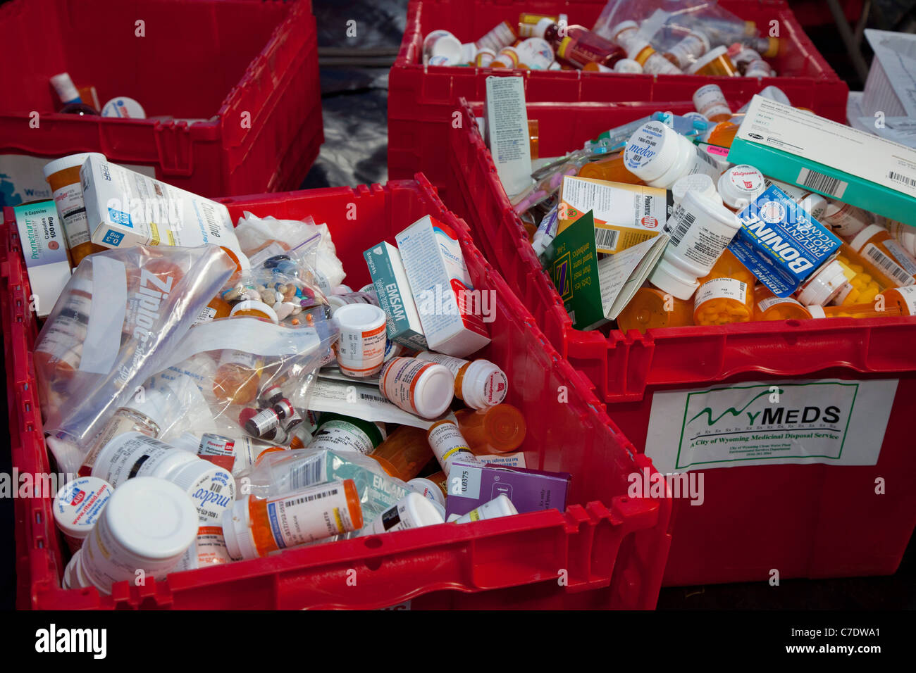 Pharmacists collect unwanted or expired prescription and over-the-counter medicines for safe disposal. Stock Photo