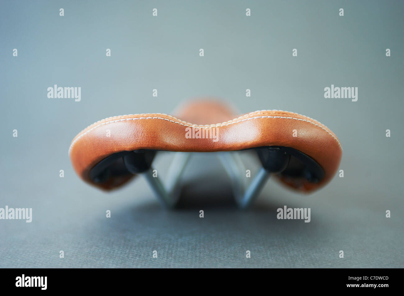 Abstract photograph of a bicycle saddle brown tan Stock Photo