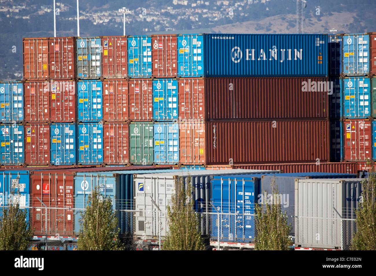 Many shipping containers stacked at Port of Oakland Stock Photo Alamy