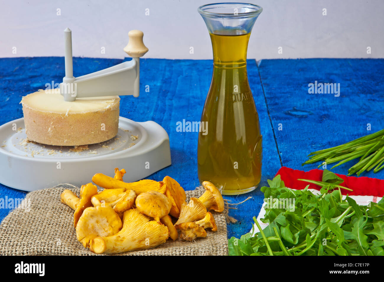 https://c8.alamy.com/comp/C7E17P/fresh-ingredients-for-a-salad-with-mushrooms-and-swiss-tete-de-moine-C7E17P.jpg