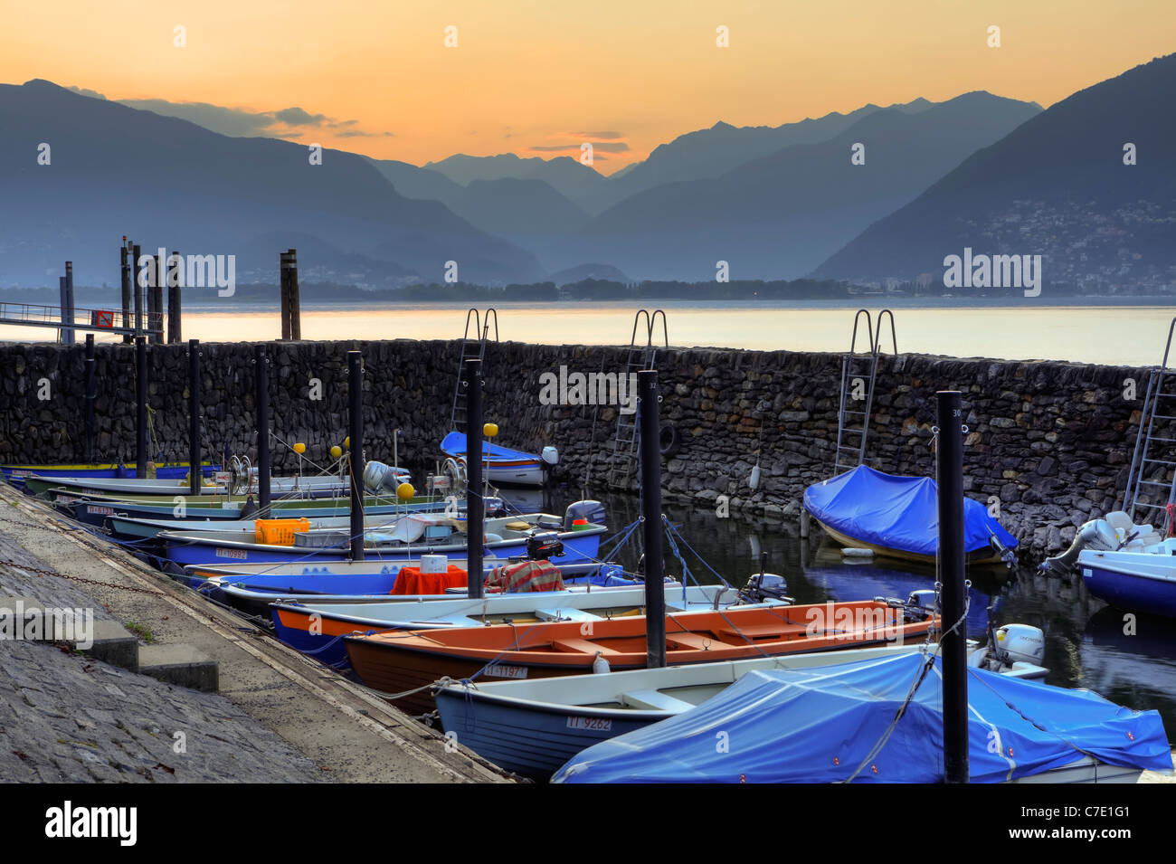 Boats in the port of Vira Gambarogno, Ticino Stock Photo