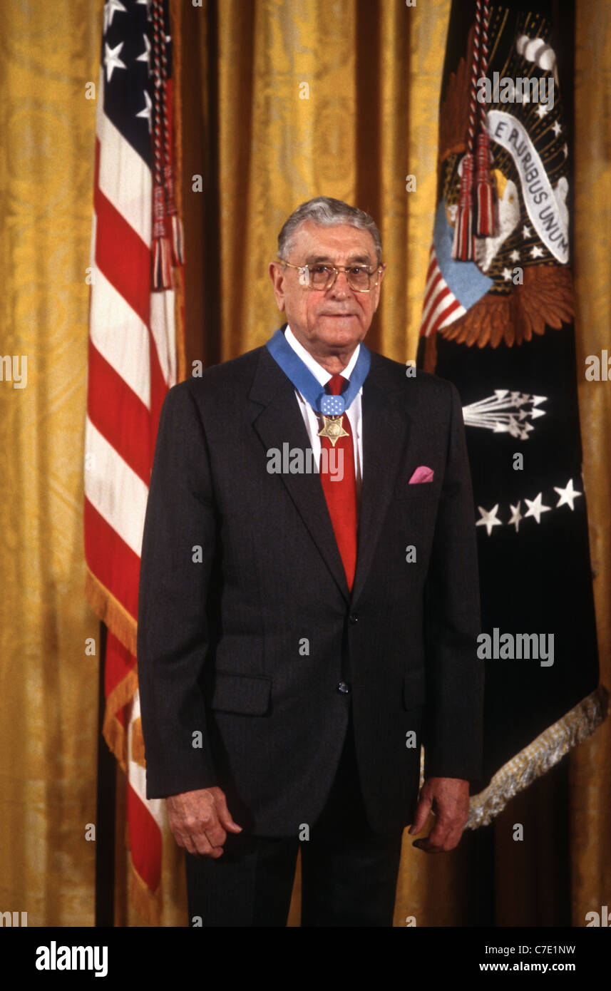 Retired Marine Major General James L. Day with his Medal of Honor